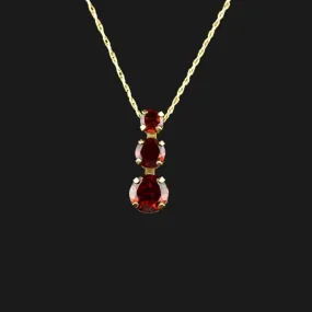 10K Gold Garnet Journey Pendant Necklace