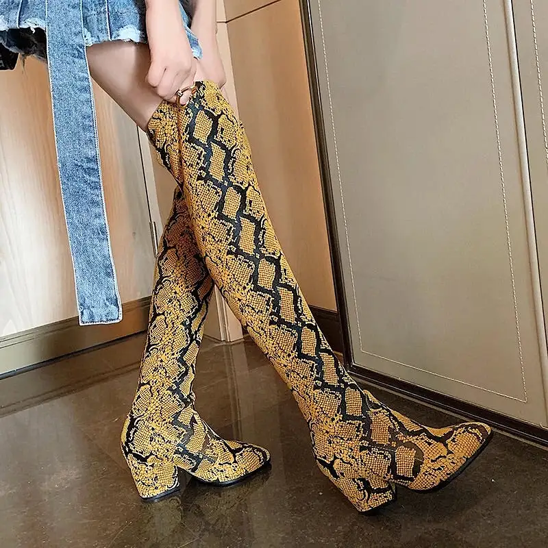 Oyu Snakeskin Boots